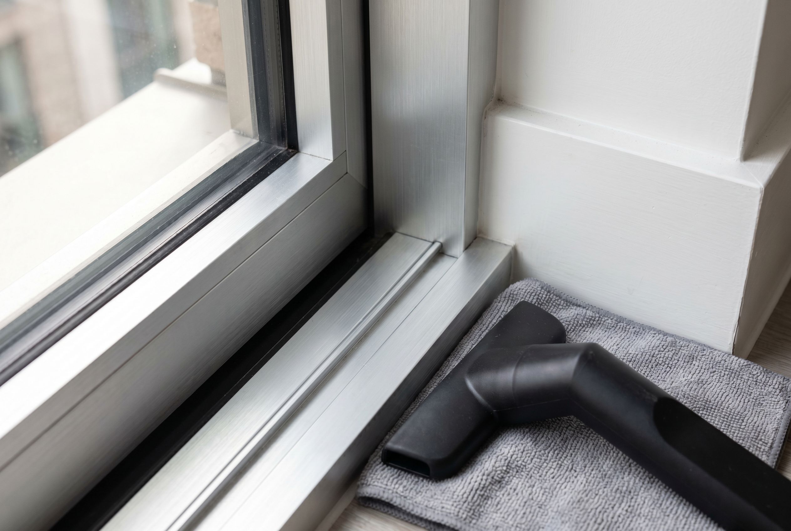 Battersea handover cleaning detail showing window tracks and builders dust removal